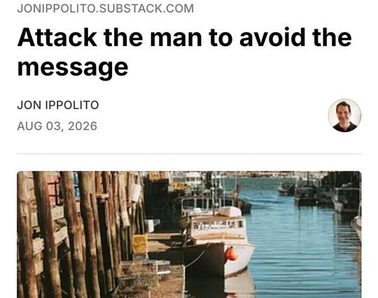 An image of a Maine harbor with the words "Attack the man to avoid the message" superimposed.