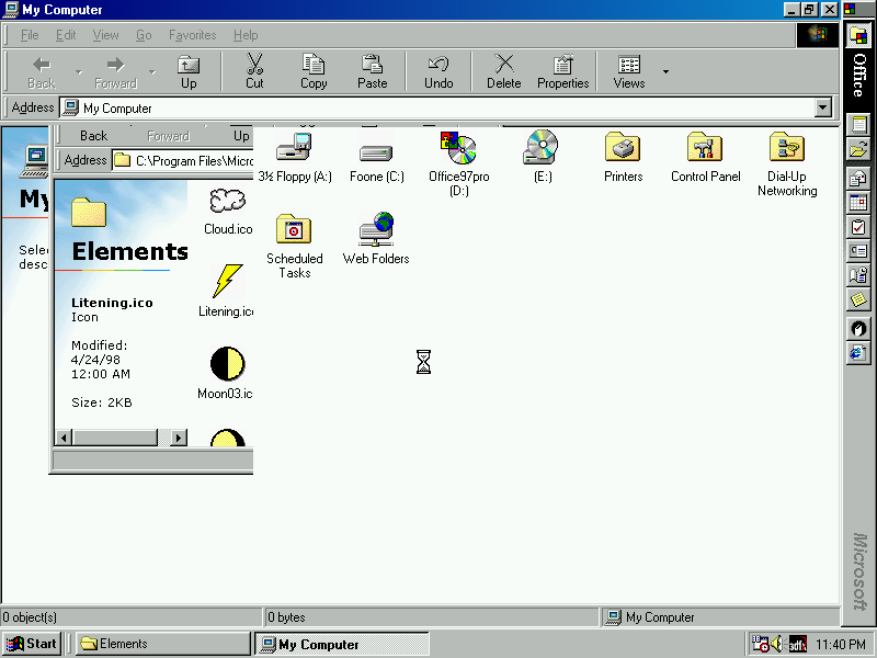 A screenshot of Windows 98, showing the Explorer viewing My Computer. Part of another folder called Elements containing icons is covering part of the screen, for no apparent reason 